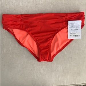Athleta Saffron Red bathing suit bottom NWT Size M